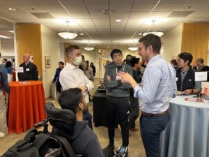 IMG_7628 copy Attendees chat during the career fair at C&C