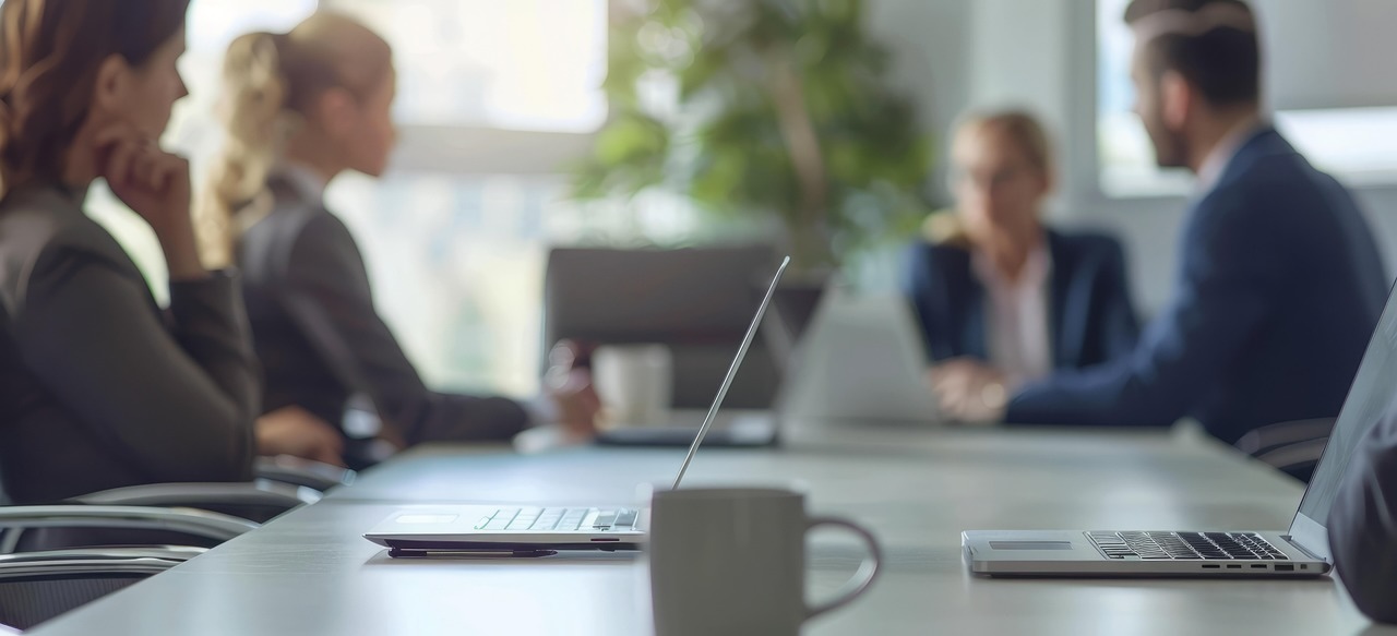 People in a meeting at a table